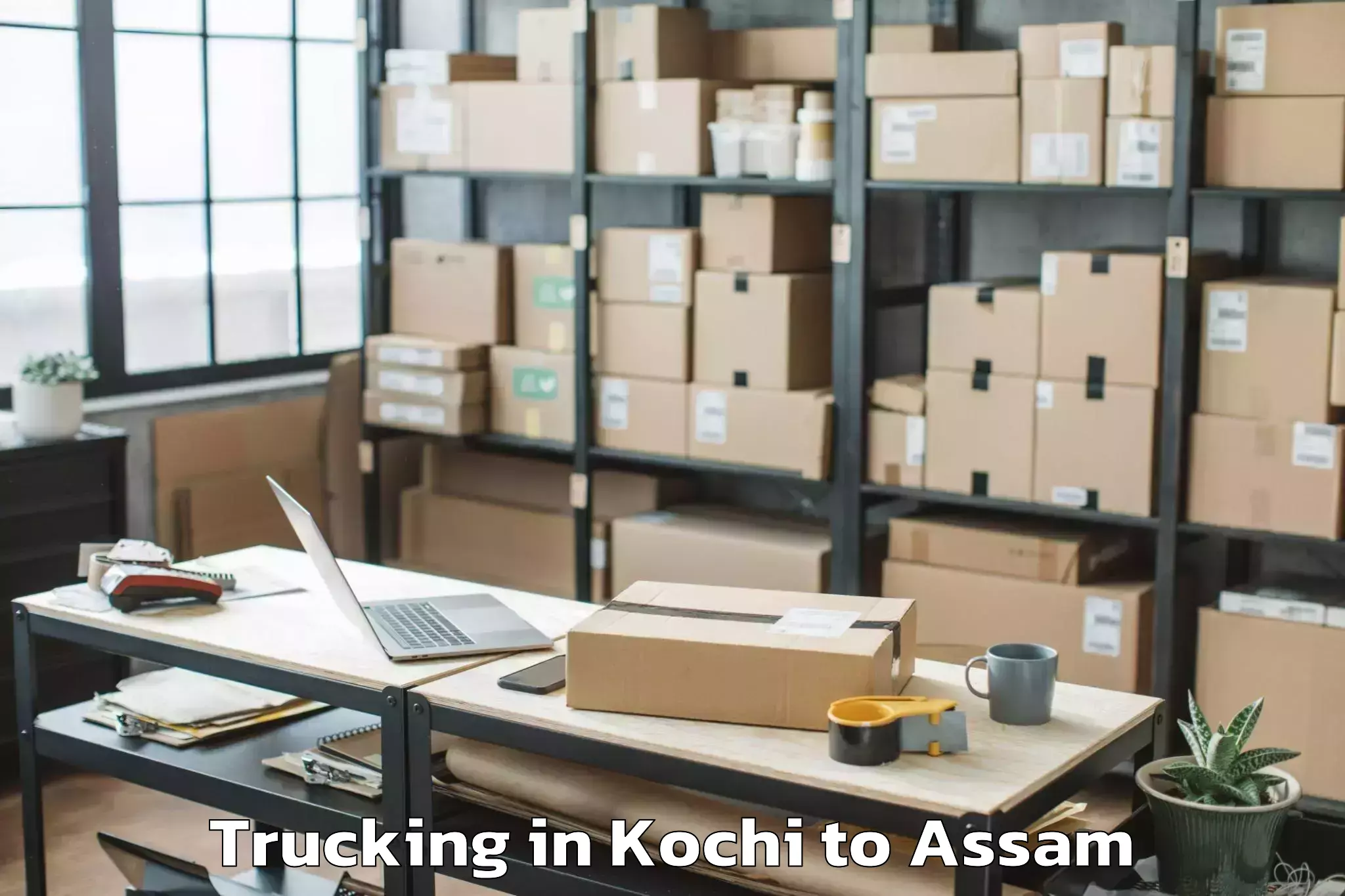 Book Kochi to Umrangso Trucking